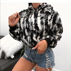 Laura’s boutique Mely camo jacket.